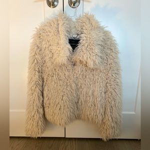 Fur coat.
